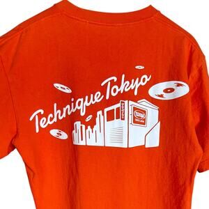 Uniqlo x Technique Tokyo World of Record Stores Orange Graphic T-Shirt - Size M
